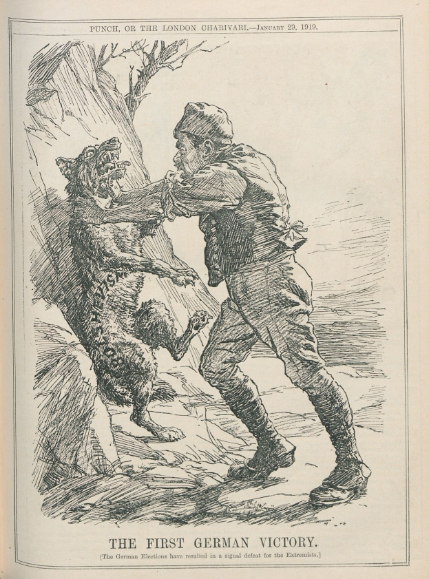 Ein aufgeschlagenes Buch mit einer Zeichnung eines Mannes mit Hut und entschlossener Miene sowie einem Hund neben ihm und der Aufschrift 'Der erste deutsche Sieg' auf der Seite.