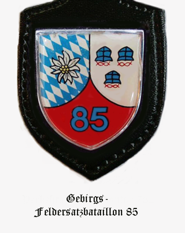 Ein Abzeichen mit der Zahl 85, das die bayerische Fußballmannschaft repräsentiert, mit deutschem Text darunter.